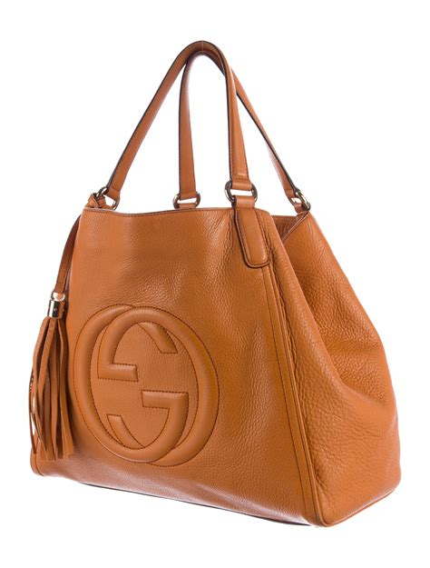 gucci handbags online.